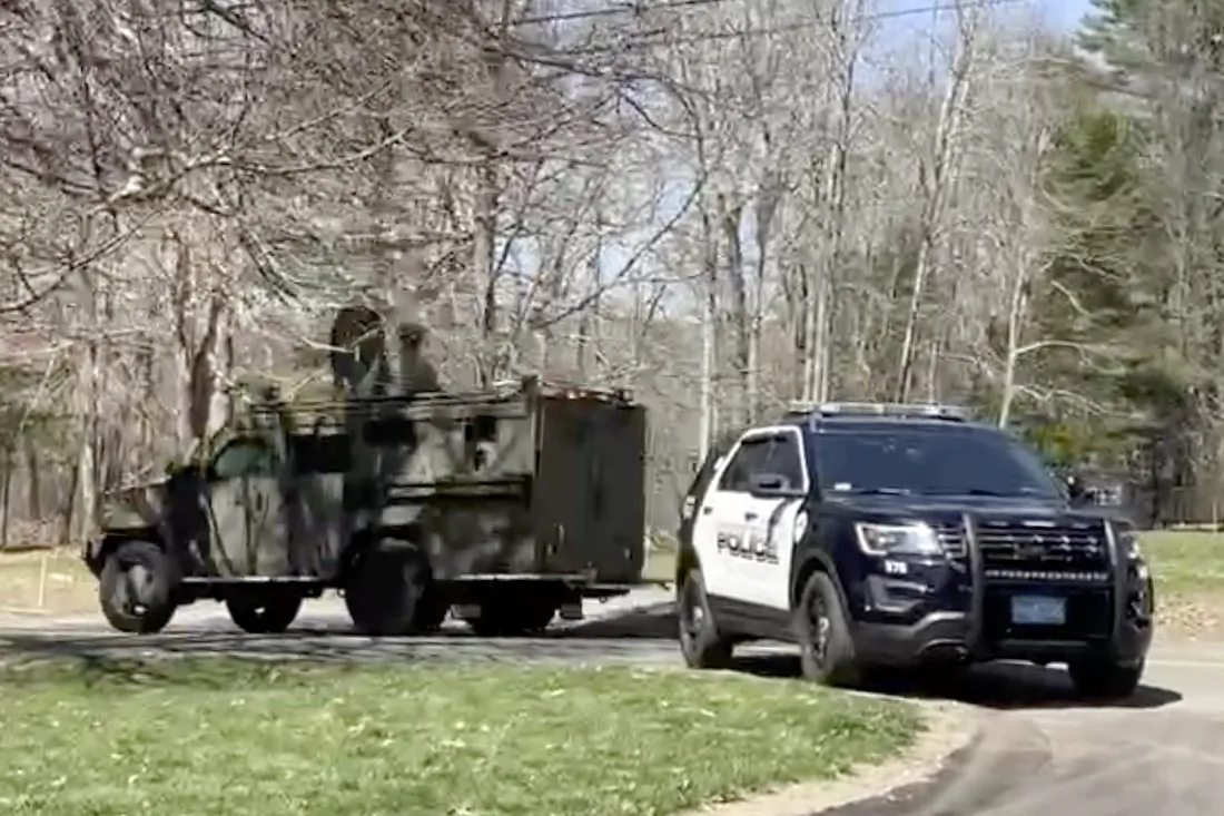 In this image taken from video, police block a road in North Dighton, Mass., on April 13, 2023. (Michelle R. Smith/AP Photo)