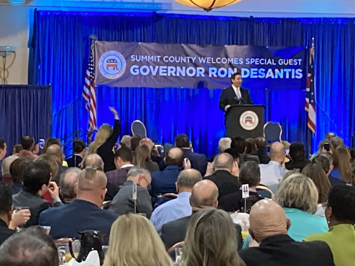 Florida Gov. Ron DeSantis speaks to a capacity crowd of 700 people at the Summit County Republican Party's Lincoln Day Breakfast on April 13, 2023. (Janice Hisle/The Epoch Times)
