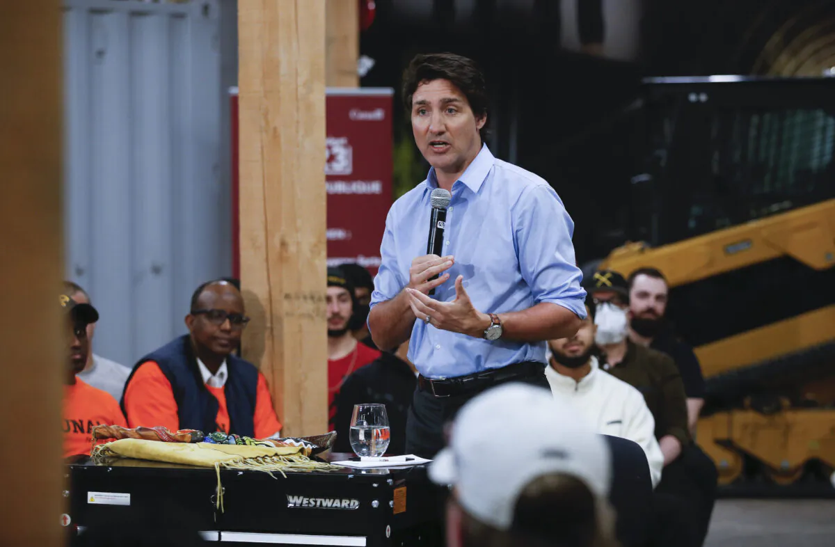 Prime Minister Justin Trudeau speaks during a town hall meeting at the Manitoba Building Trades Institute in Winnipeg, April 12, 2023. (The Canadian Press/John Woods)