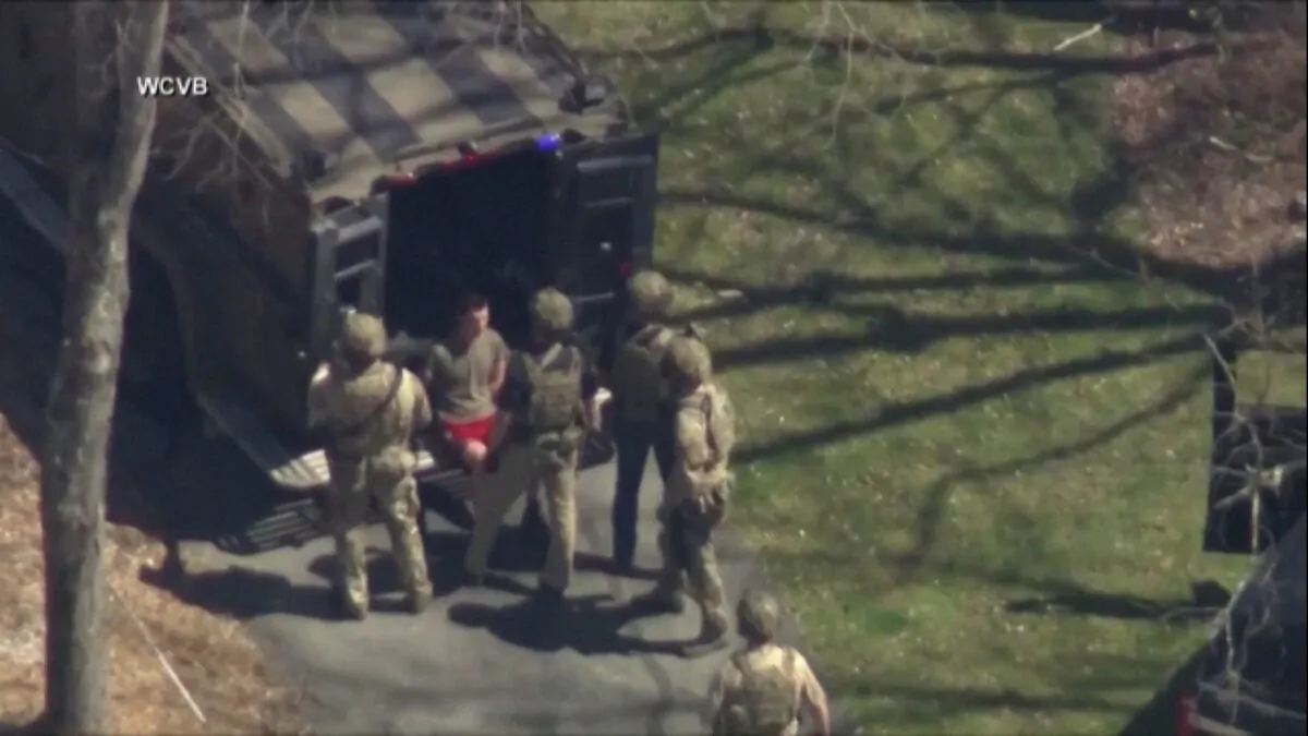 FBI agents arrest Jack Teixeira outside a residence in this still image taken from video in North Dighton, Mass., on April 13, 2023. (WCVB-TV/via ABC/via Reuters)