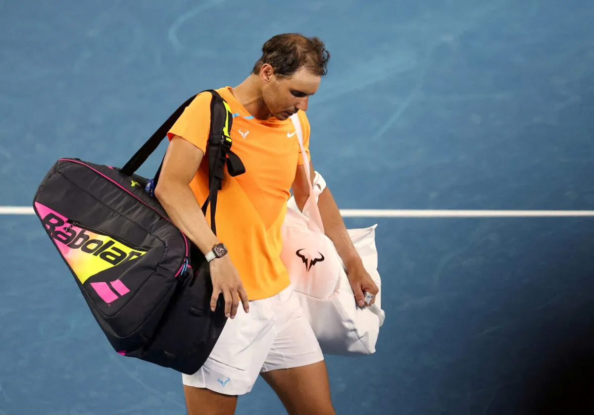 Spain's Rafael Nadal looks dejected after losing his second round match against Mackenzie Mcdonald of the U.S. during Australian Open, at  Melbourne Park, Melbourne, Australia, on Jan. 18, 2023. (Hannah Mckay/Reuters)