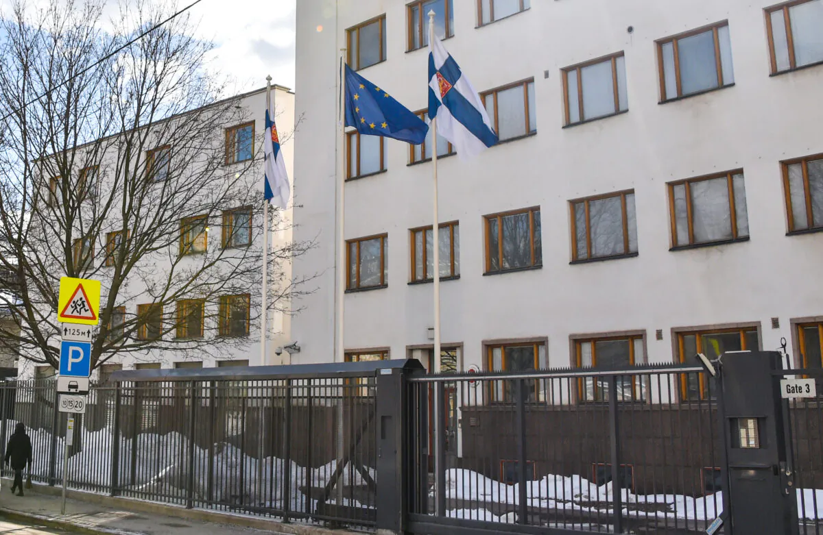 A woman walks past the embassy of Finland in Moscow on March 29, 2018. (Vasily Maximov/AFP via Getty Images)