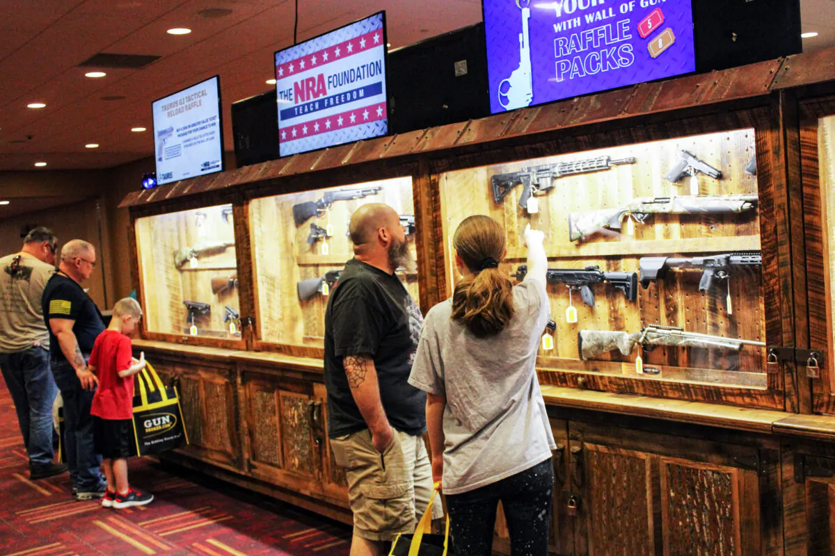 Visitors to the NRA's 2023 Annual Meetings and Exhibits in Indianapolis on April 13, 2023. (Michael Clements/The Epoch Times)