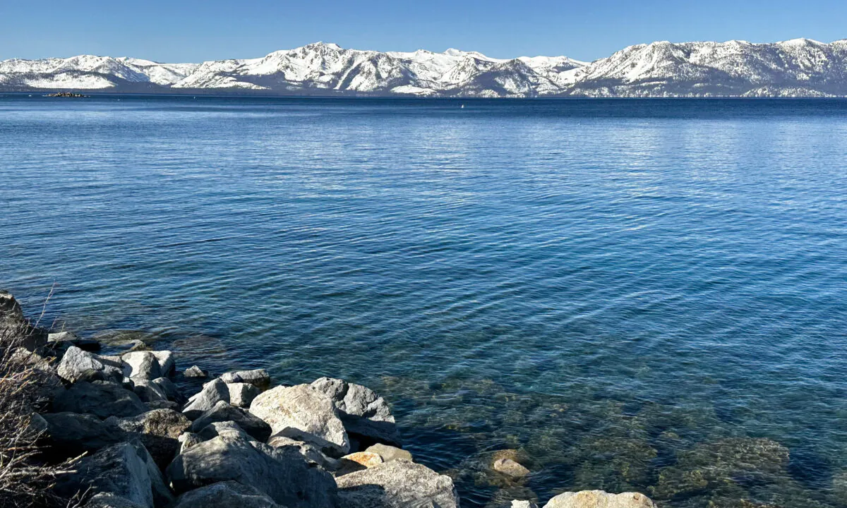 Lake Tahoe’s clear-blue water is seen at Zephyr Cove Marina in Nevada April 13, 2023. The M.S. Dixie II tour boat docked at the marina is popular with summer tourists. (Jill McLaughlin/The Epoch Times)