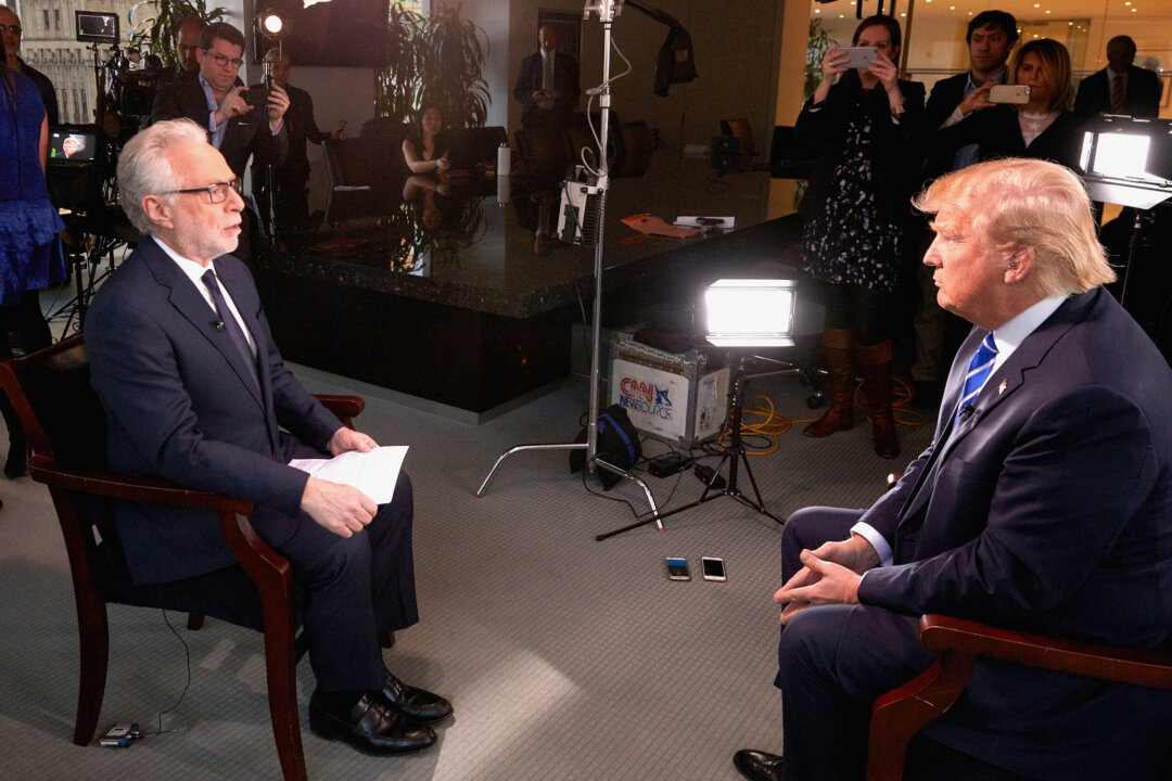 Republican Presidential Candidate Donald Trump is interviewed by journalist Wolf Blitzer for The Situation Room on CNN in New York City on Jan. 6, 2016. (Regine Mahaux/Getty Images)