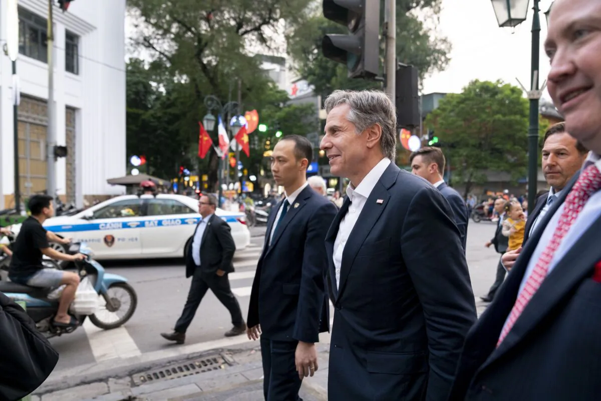 U.S. Secretary of State Antony Blinken, accompanied by Ambassador of the United States to Vietnam Marc Knapper (R), walks to Binh Minh Jazz Club in Hanoi, Vietnam, on April 15, 2023. (Andrew Harnik/AP Photo)