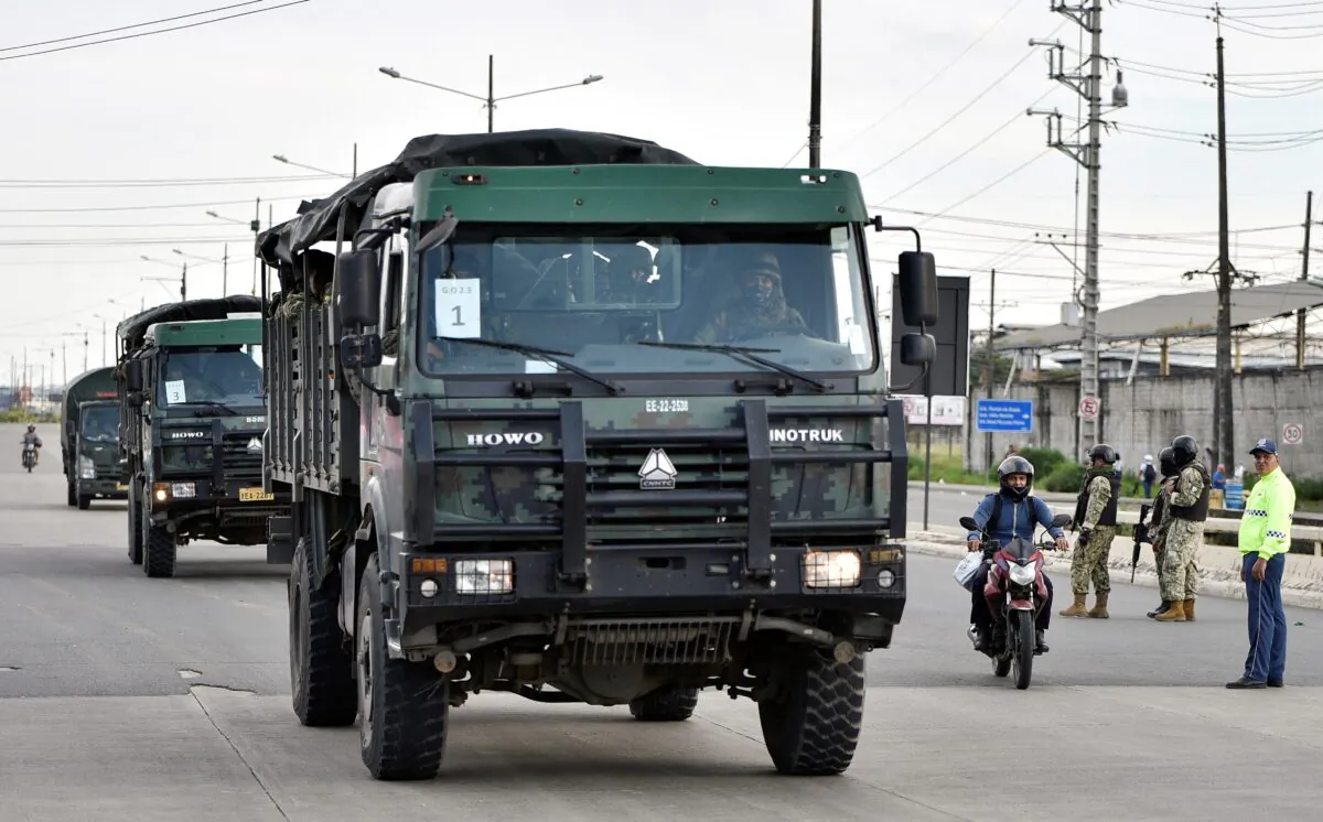Security personnel arrive at the Penitenciaria del Litoral prison after a riot, in Guayaquil, Ecuador, on April 14, 2023. (Vicente Gaibor del Pino/Reuters)