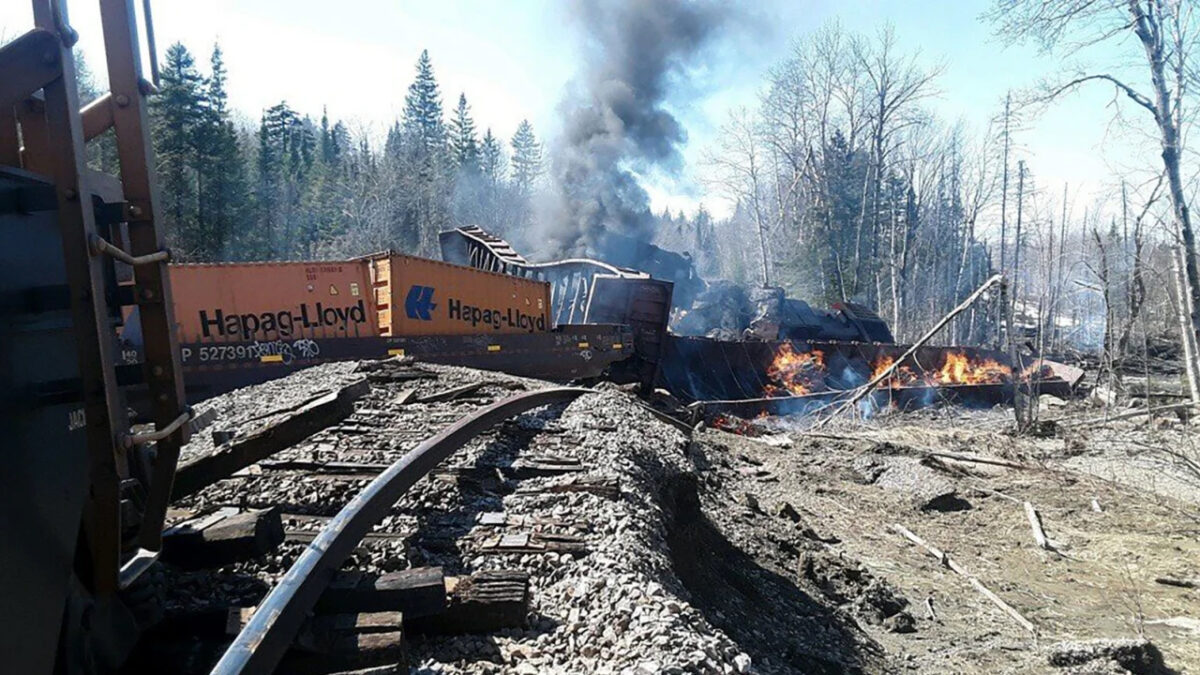 NextImg:Freight Train Engines, Cars Derail and Catch Fire in Maine