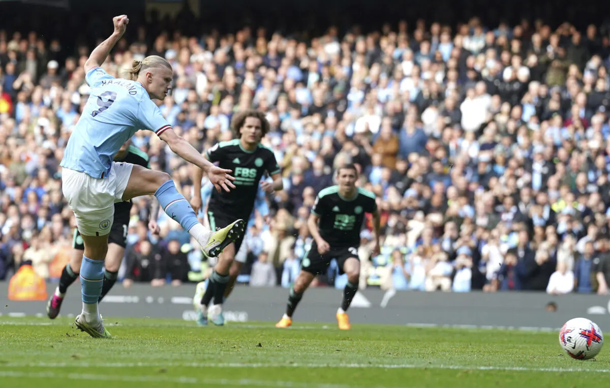 Manchester City's Erling Haaland scores his side's second goal during the English Premier League soccer match between Manchester City and Leicester City at Etihad Stadium in Manchester, England, on April 15, 2023. (Nick Potts/PA via AP)