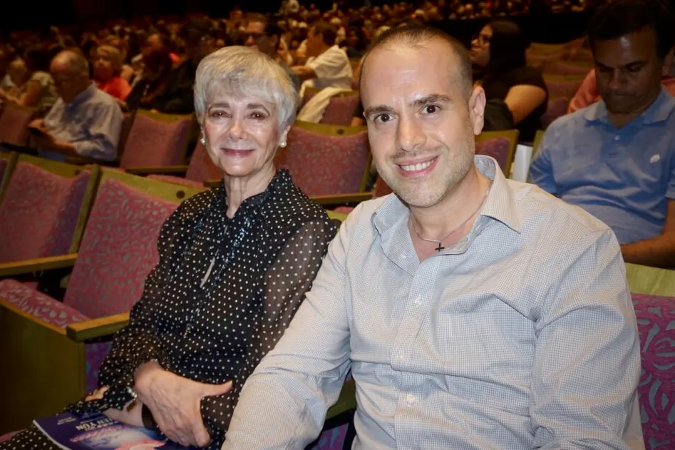 Professor Jorge Canchola (R) enjoyed Shen Yun's evening performance at the McAllen Performing Arts Center on April 15, 2023. (Yeawen Hung/The Epoch Times)