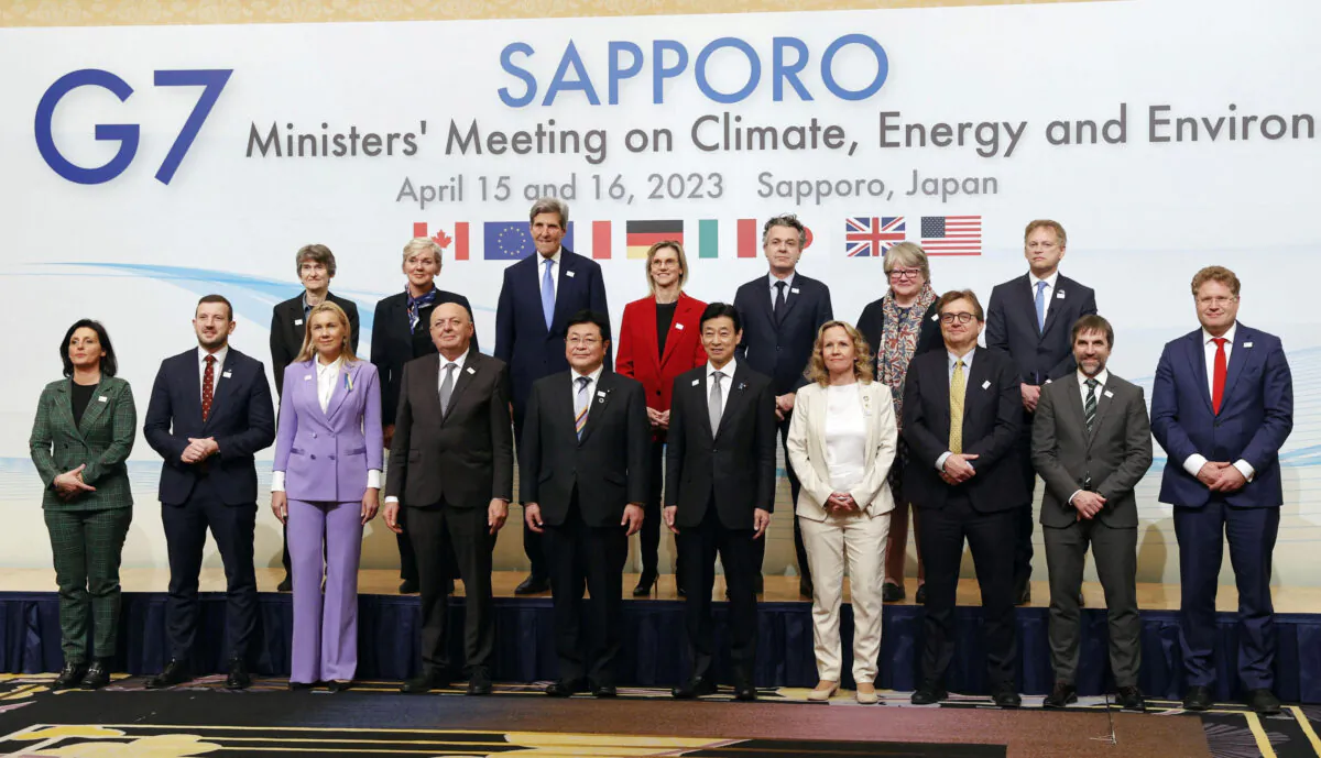 Japan's Minister of Economy, Trade and Industry Yasutoshi Nishimura, Environment Minister Akihiro Nishimura and other delegates attend the photo session of G-7 Ministers' Meeting on Climate, Energy, and Environment in Sapporo, Japan, on April 15, 2023. (Kyodo via Reuters)