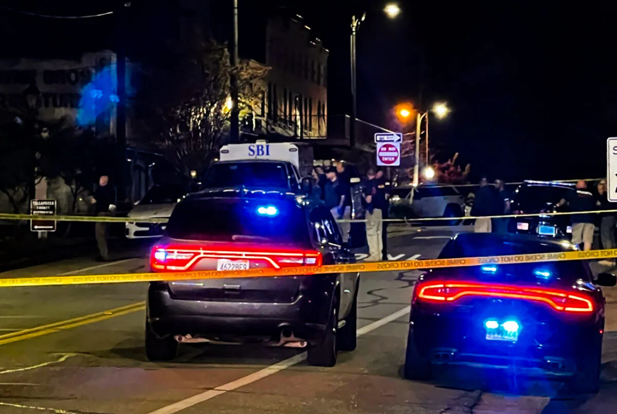 Authorities work on the scene of a shooting in Dadeville, Ala., on April 15, 2023. (Elizabeth White/WRBL via AP)
