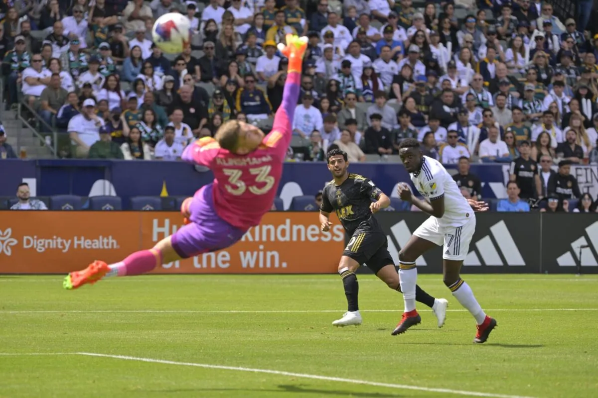 Los Angeles FC forward Carlos Vela (10) scores a goal past Los Angeles Galaxy goalkeeper Jonathan Klinsmann and midfielder Memo Rodriguez (17) in the first half at Dignity Health Sports Park Carson, Calif., on April 16, 2023. (Jayne Kamin-Oncea/USA TODAY Sports via Field Level Media)