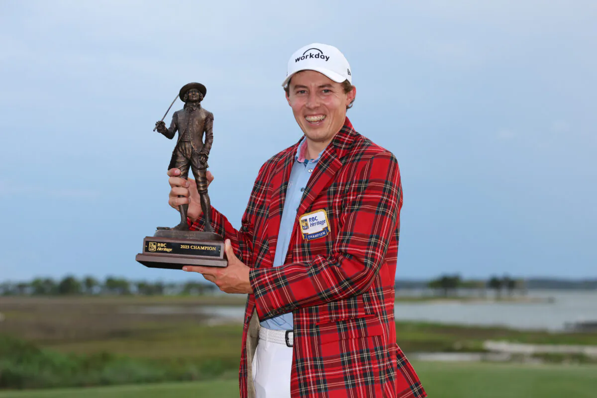 Matt Fitzpatrick of England celebrates with the trophy in the Heritage Plaid tartan jacket after winning in a playoff during the final round of the RBC Heritage at Harbour Town Golf Links  in Hilton Head Island, S.C., April 16, 2023. (Andrew Redington/Getty Images)