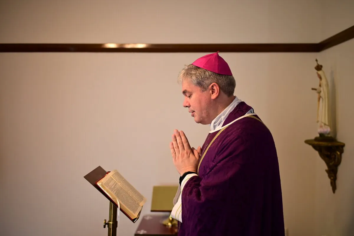 Bishop Richard Umbers during a livestream service at St Paul of the Cross church in Sydney, Sunday, March 29, 2020. (AAP Image/Joel Carrett)