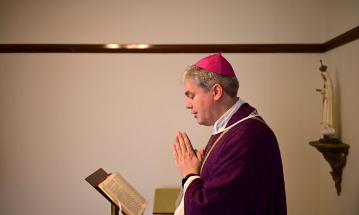 Bishop Richard Umbers during a livestream service at St Paul of the Cross church in Sydney, Sunday, March 29, 2020. (AAP Image/Joel Carrett)