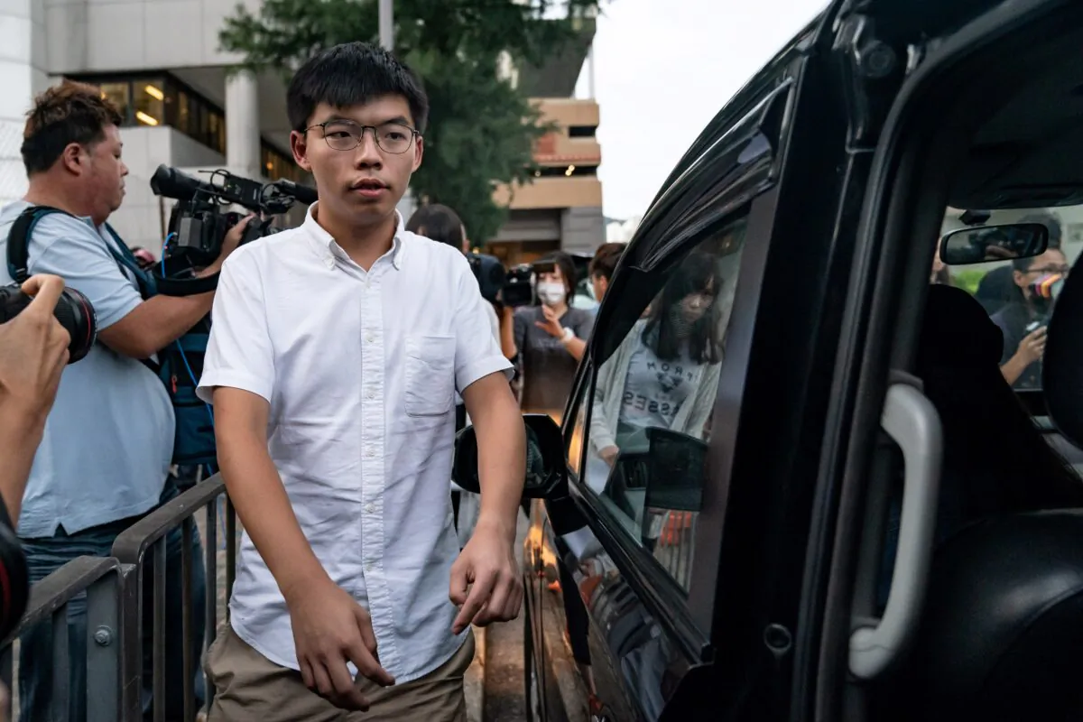 Hong Kong pro-democracy Joshua Wong leaves the Eastern Magistrates' Courts after being arrested and released on bail in Hong Kong on Aug. 30, 2019. (Anthony Kwan/Getty Images)