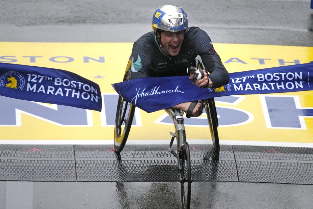 NextImg:Hug, Scaroni Take Boston Marathon Wheelchair Titles