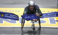 Hug, Scaroni Take Boston Marathon Wheelchair Titles