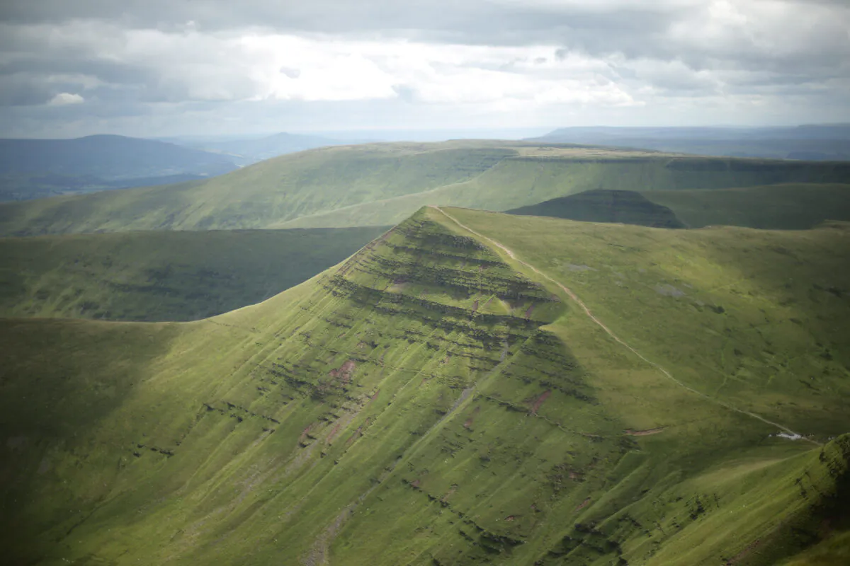 The summit of Cribyn mountain as seen from Pen y Fan, in Brecon Beacons National Park, Wales, on July 12, 2016. (Yui Mok/PA Media0