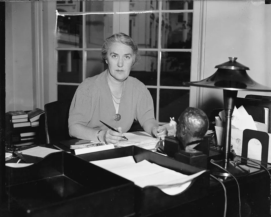 Marguerite "Missy" LeHand, personal secretary to Franklin Delano Roosevelt from 1921–1941, at her desk in the White House, circa 1935. (Public Domain)