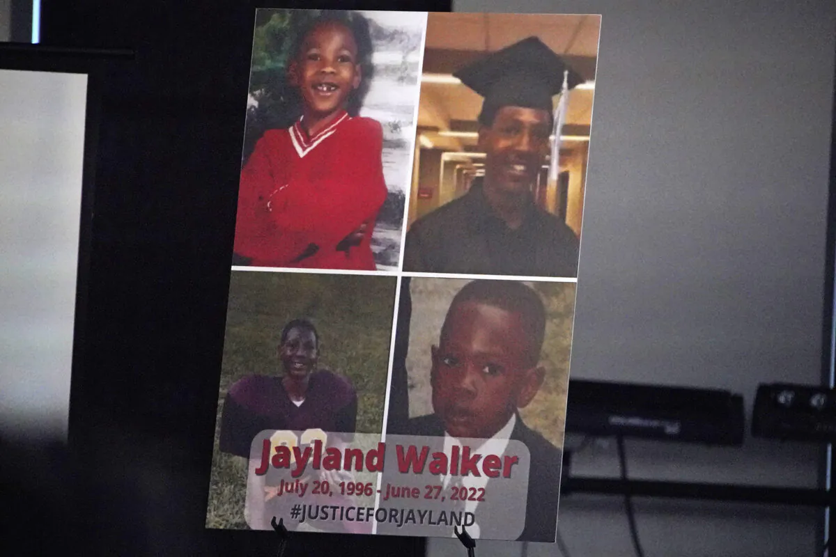 A poster on the stage during a news conference following the funeral service for Jayland Walker at the Akron Civic Center in Akron, Ohio, on July 13, 2022. (Gene J. Puskar/AP Photo)