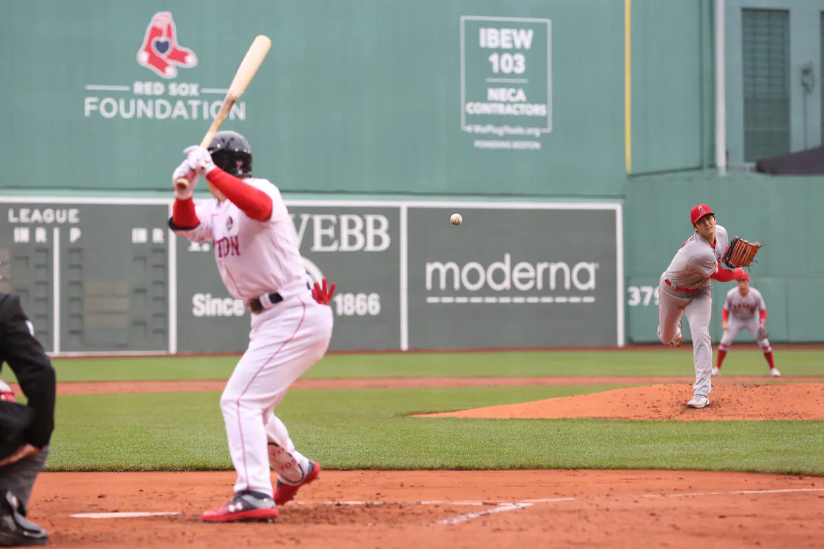 Shohei Ohtani (17) of the Los Angeles Angels delivers a pitch to Masataka Yoshida (7) of the Boston Red Sox during the first inning against the Boston Red Sox at Fenway Park in Boston on April 17, 2023. (Paul Rutherford/Getty Images)