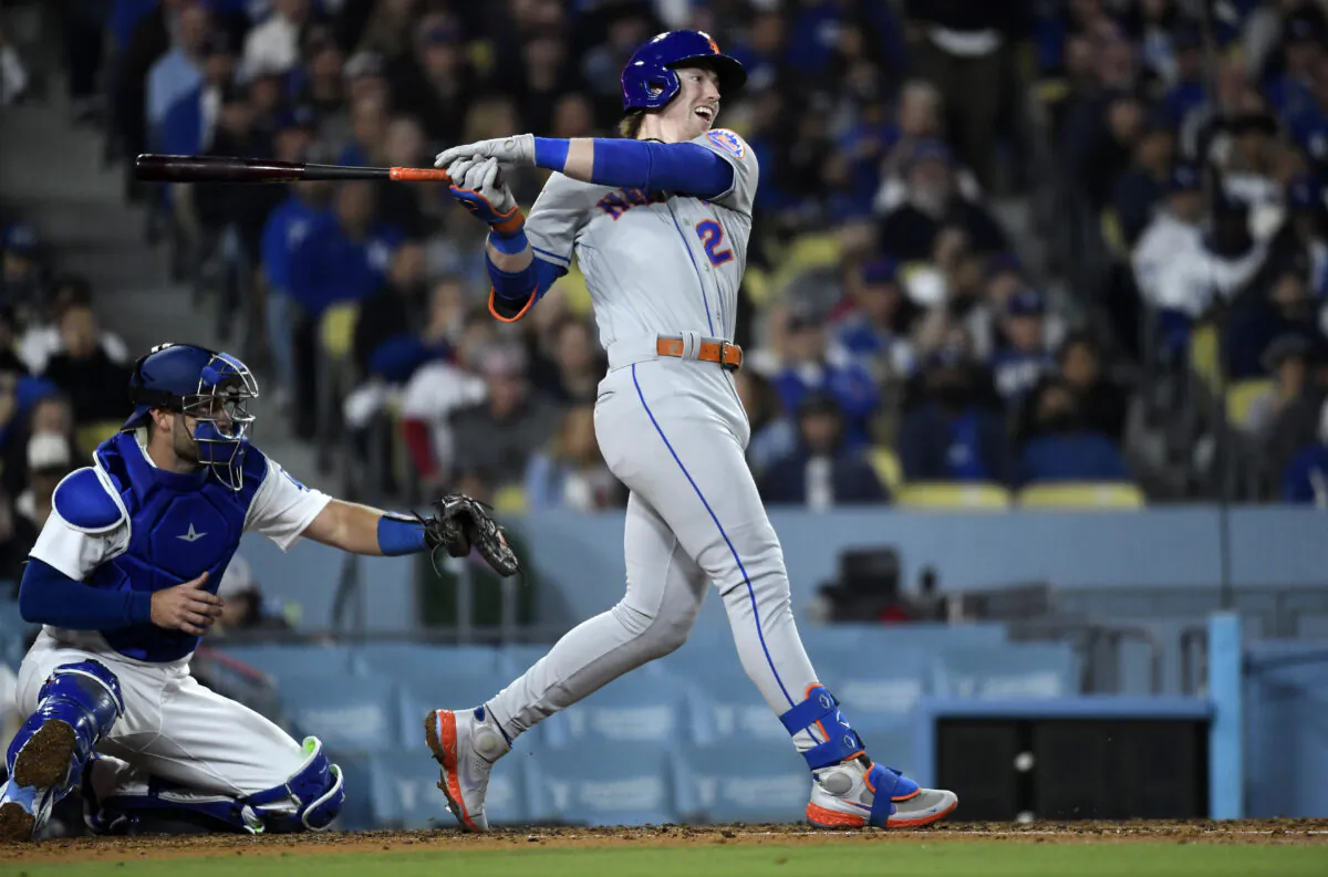 Brett Baty (22) of the New York Mets hits a one run base hit during the fourth inning to score Jeff McNeil (1) against starting pitcher Dustin May (85) of the Los Angeles Dodgers at Dodger Stadium in Los Angeles on April 17, 2023. (Kevork Djansezian/Getty Images)