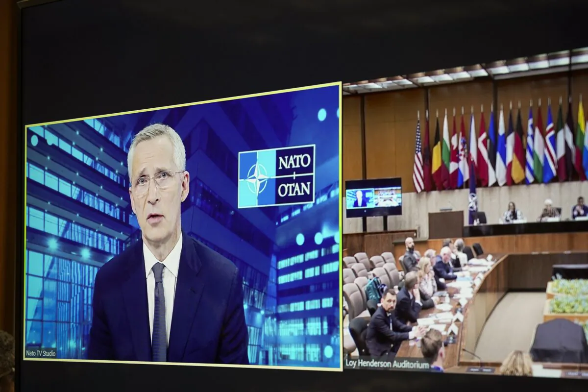 NATO Secretary General Jens Stoltenberg joins online the 18th annual NATO Conference on Arms Control, Disarmament, and Weapons of Mass Destruction Non-Proliferation in Washington on April 18, 2023. (Madalina Vasiliu/The Epoch Times)