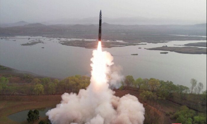 A view of a test launch of a new solid-fuel intercontinental ballistic missile (ICBM) Hwasong-18 at an undisclosed location in this still image of a photo used in a video released by North Korea's Korean Central News Agency (KCNA) on April 14, 2023. (KCNA via Reuters)