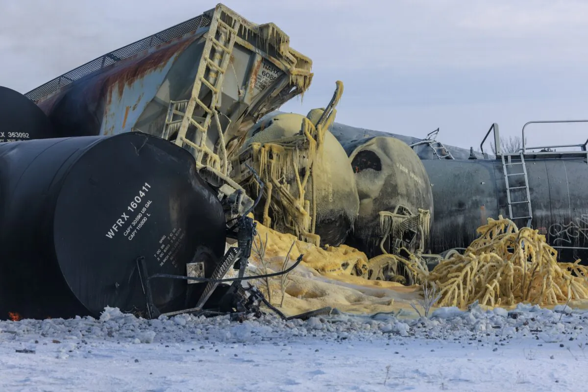 Train cars pile up after a BNSF freight train derailed near Raymond, Minn., on March 30, 2023. (Kerem Yücel/Minnesota Public Radio via AP)