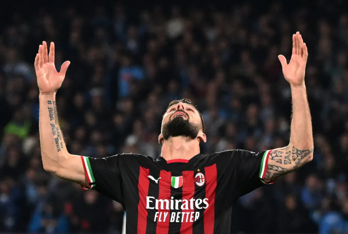 AC Milan's Olivier Giroud celebrates scoring their first goal during the Champions League - Quarter Final - Second Leg - Napoli v AC Milan soccer match at Stadio Diego Armando Maradona in Naples on April 18, 2023. (Alberto Lingria/Reuters)
