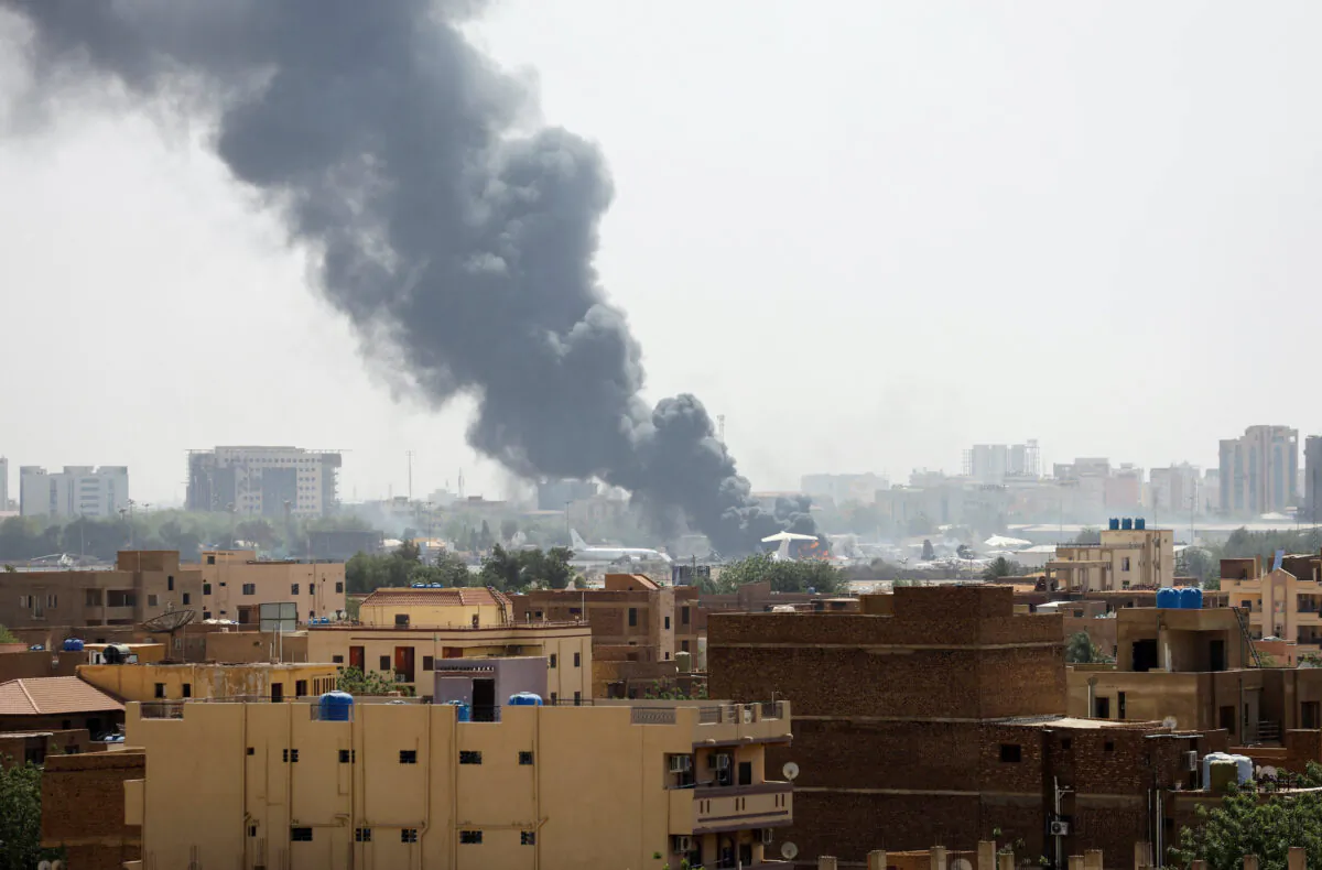Smoke rises from burning aircraft inside Khartoum Airport during clashes between the paramilitary Rapid Support Forces and the army in Khartoum, Sudan, on April 17, 2023. (Stringer/Reuters)
