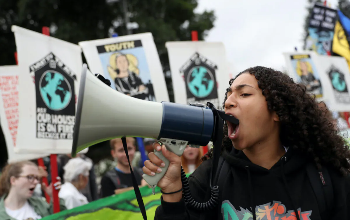 A youth climate activist uses a bullhorn during a protest in San Ramon, Calif., on Sept. 27, 2019. (Justin Sullivan/Getty Images)