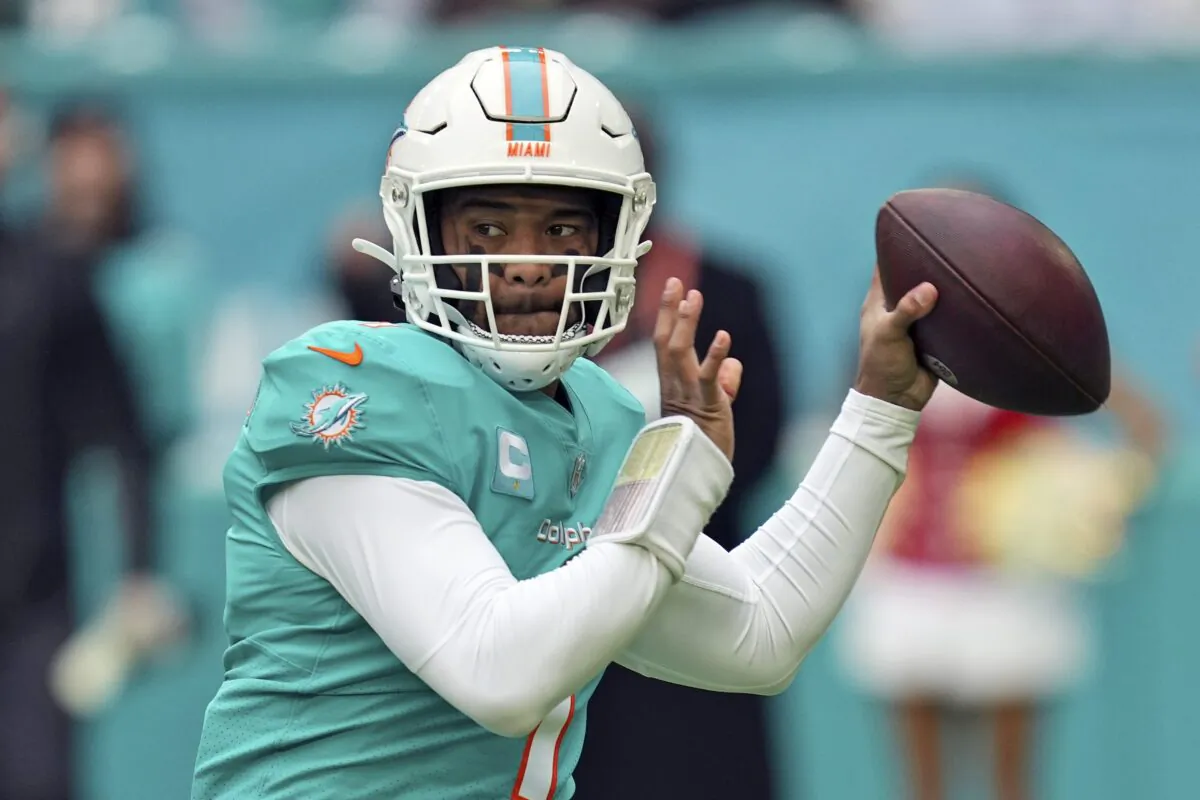 Miami Dolphins quarterback Tua Tagovailoa looks to pass during the first half of an NFL football game against the Green Bay Packers in Miami Gardens, Fla., on Dec. 25, 2022. (Jim Rassol/AP Photo)
