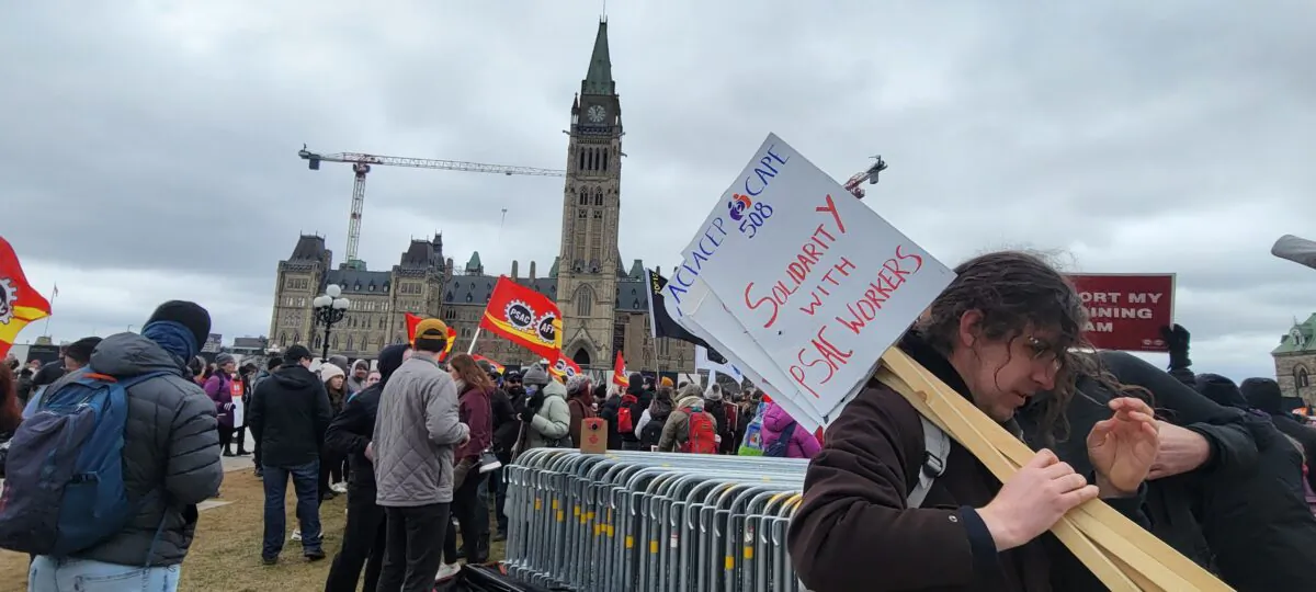 Hundreds of striking workers with the Public Service Alliance of Canada gather on Parliament Hill on April 19, 2023. (Matthew Horwood/The Epoch Times)