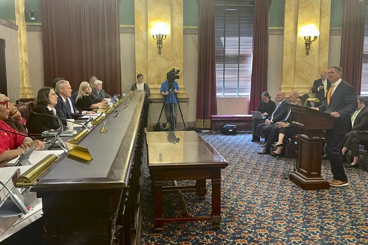 Norfolk Southern CEO Alan Shaw (R) testifies before an Ohio Senate rail safety panel at the statehouse in Columbus, Ohio, on April 18, 2023. (Samantha Hendrickson/AP Photo)