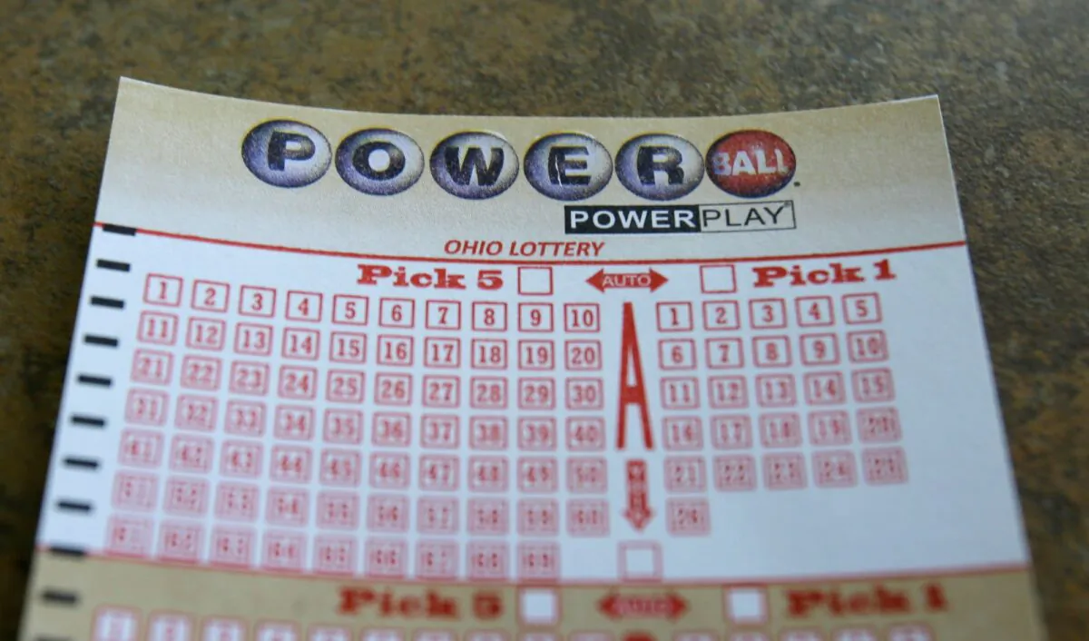 A Powerball lottery card rests on a table in Lyndhurst, Ohio on Jan. 8, 2016. (Tony Dejak/AP Photo)