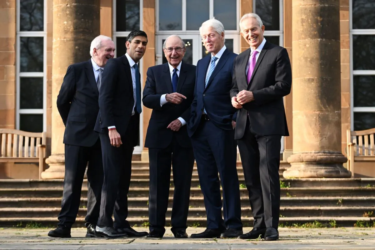 Prime Minister Rishi Sunak (2nd from L) poses with (L to R) former Irish Prime Minister Bertie Ahern, former U.S. Sen. George Mitchell, former U.S. President Bill Clinton, and former British Prime Minister Tony Blair at Hillsborough Castle in County Down, Northern Ireland, on April 19, 2023. (PA Media)