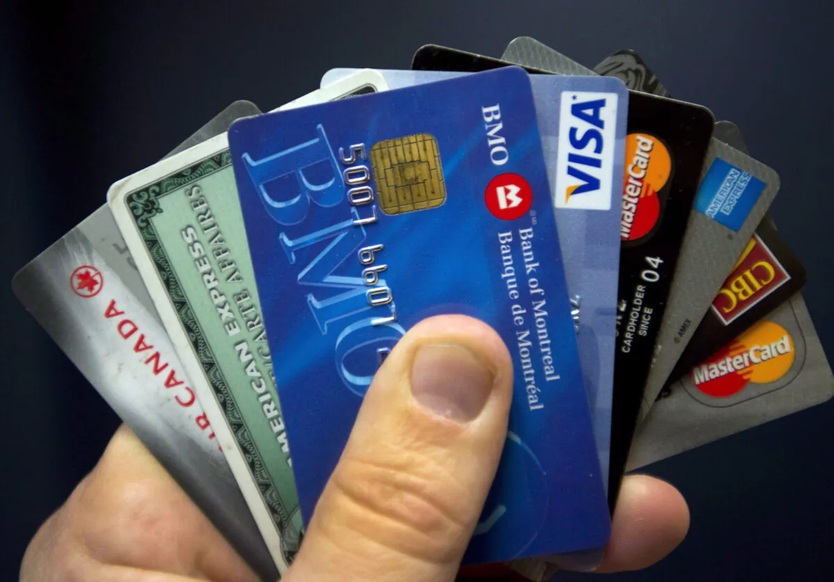 A file photo of debit and credit cards displayed in Montreal. (Ryan Remiorz/The Canadian Press)