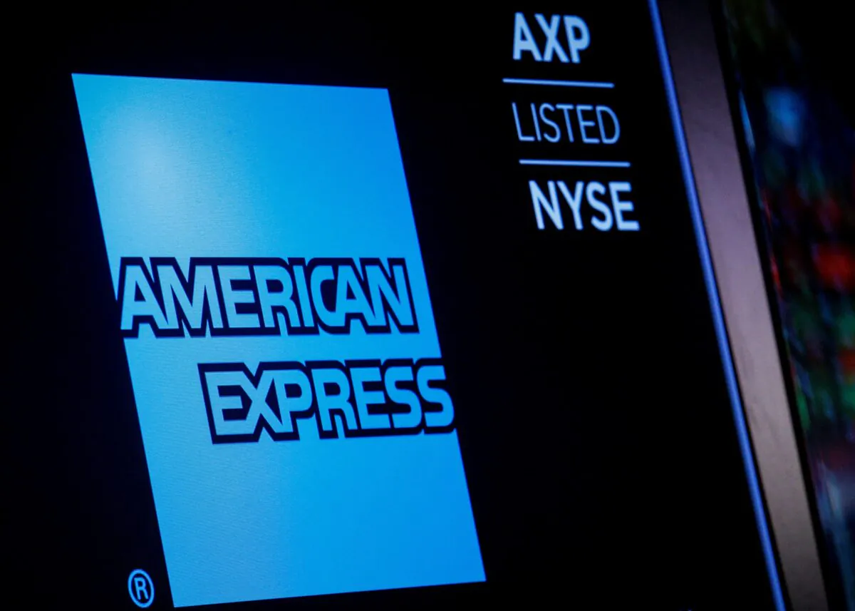 American Express logo and trading symbol are displayed on a screen at the New York Stock Exchange (NYSE) in New York on Dec. 6, 2017. (Brendan McDermid/Reuters)
