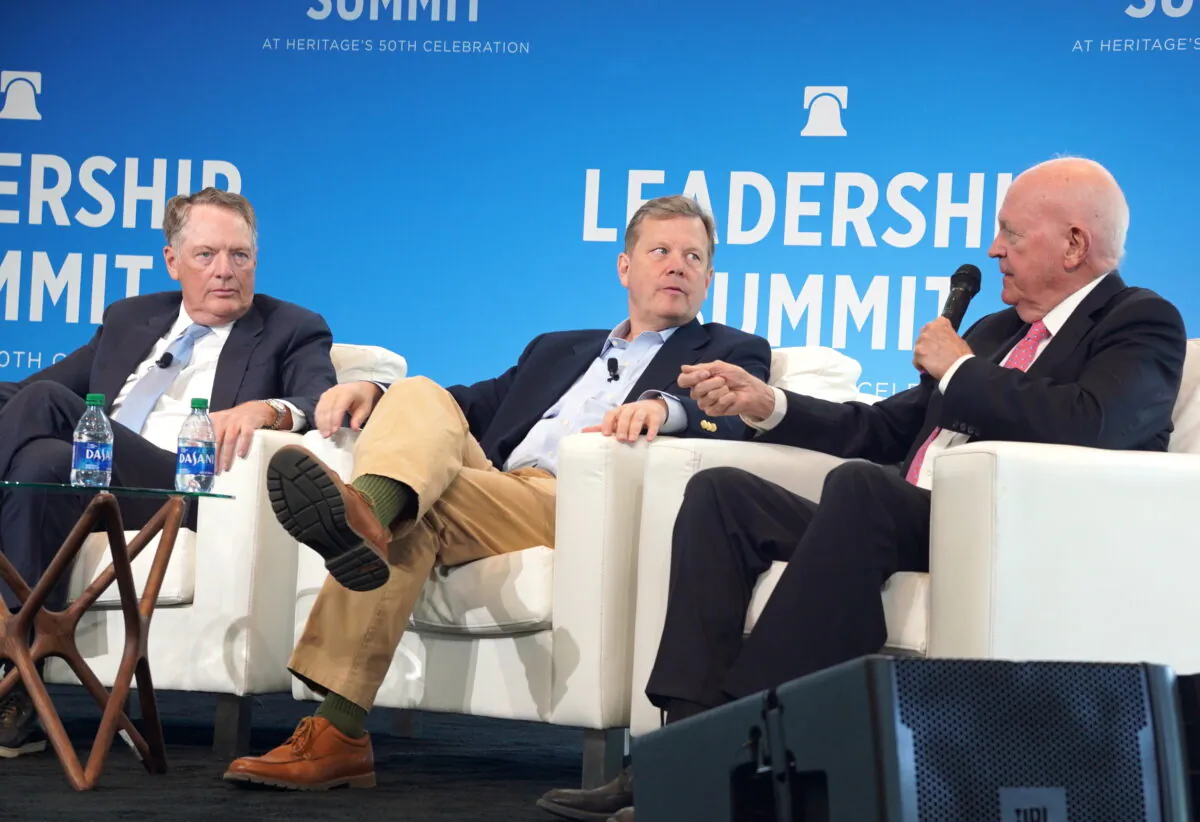 Robert Lighthizer (L), Peter Schweizer (C), president of Government Accountability Institute, and Michael Pillsbury, senior fellow at the Heritage Foundation, at the Heritage Foundation's Leadership Summit in National Harbor, Md., on Apr. 20, 2023. (Terri Wu/The Epoch Times)