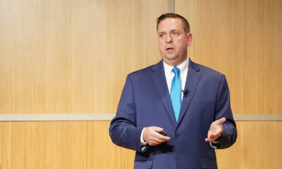 Neuhaus Touts Strong Finance, Flags Underlying Risks at Annual Address