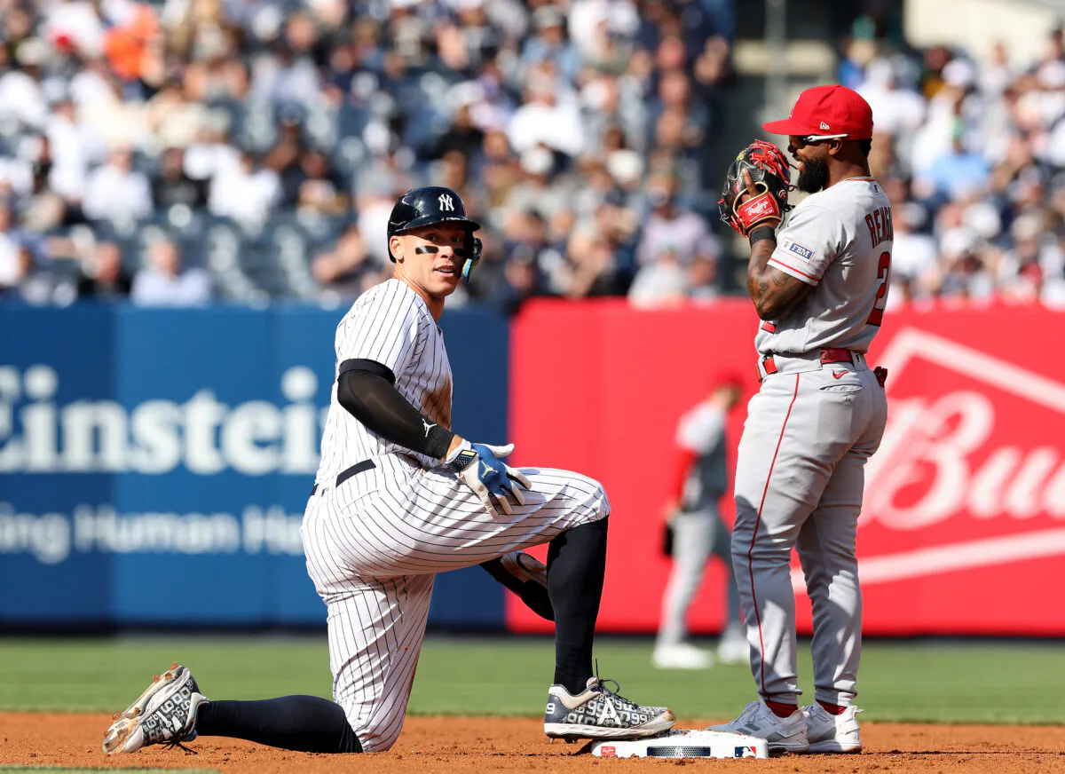 Aaron Judge (99) of the New York Yankees is nearly picked off at second as Luis Rengifo (2) of the Los Angeles Angels stands by in the first inning at Yankee Stadium in New York City on April 20, 2023. (Elsa/Getty Images)