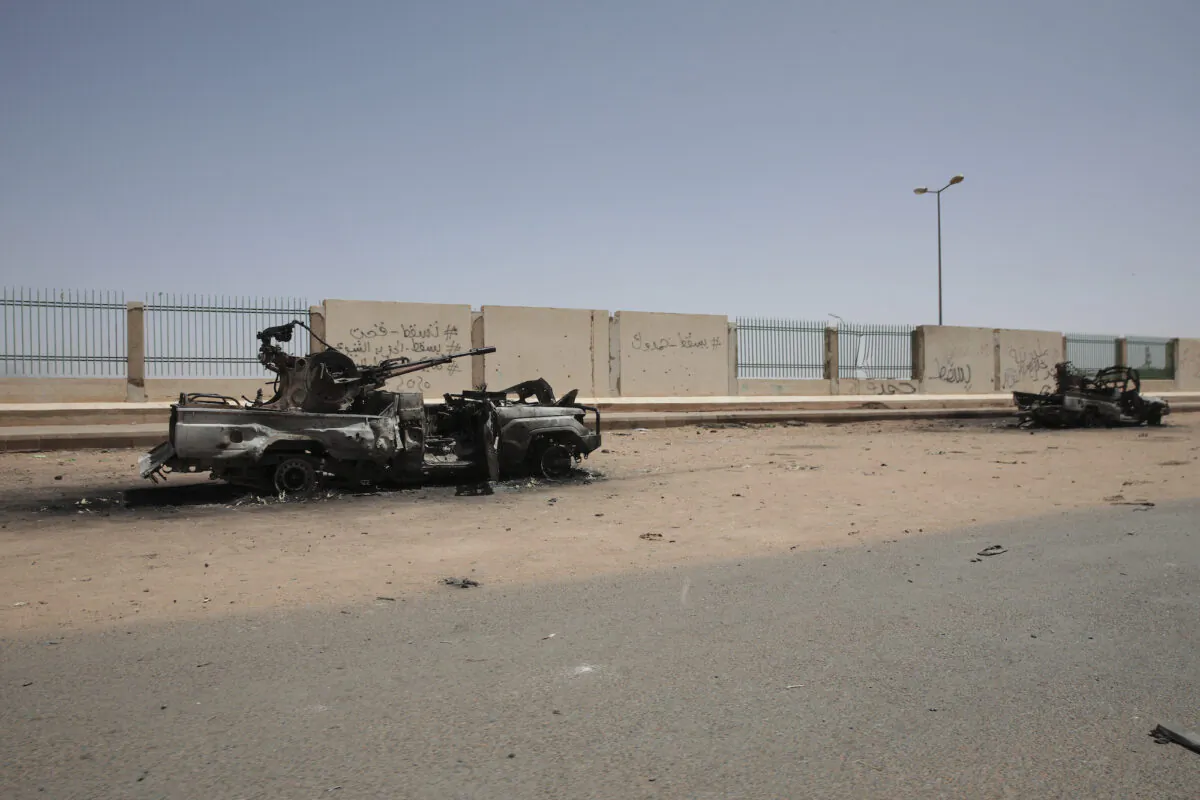 Destroyed military vehicles are seen in southern in Khartoum, Sudan, on April 20, 2023. (Marwan Ali/AP Photo)