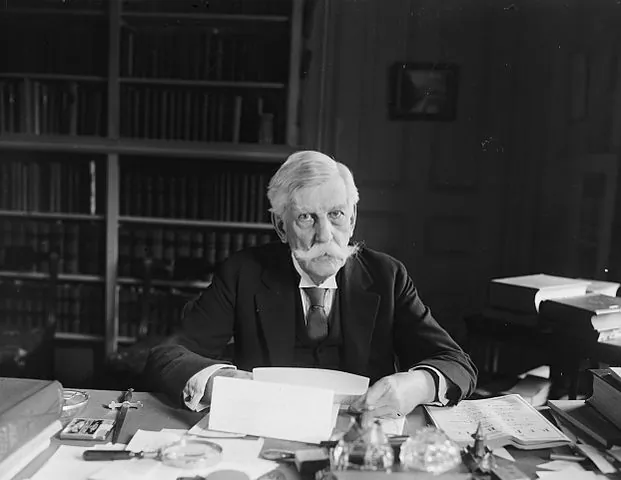 Oliver Wendell Holmes came up with the clear and present danger test in an opinion written on the Schenck v. United States case in 1919. Oliver Wendell Holmes at his desk circa 1924. Library of Congress. (Public Domain)