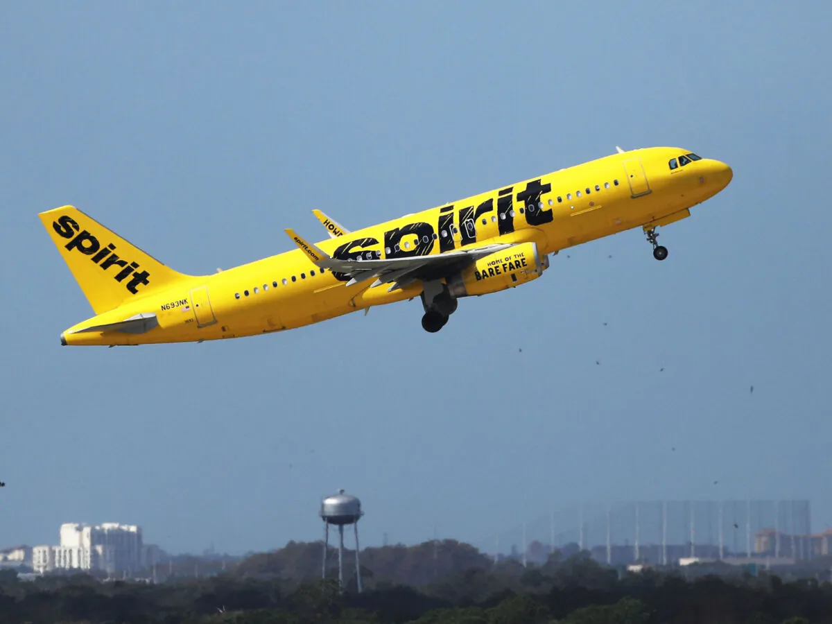 A Spirit Airlines Airbus A320-232 takes off at the Orlando International Airport in November 2020. (Ricardo Ramirez Buxeda/Orlando Sentinel/TNS)