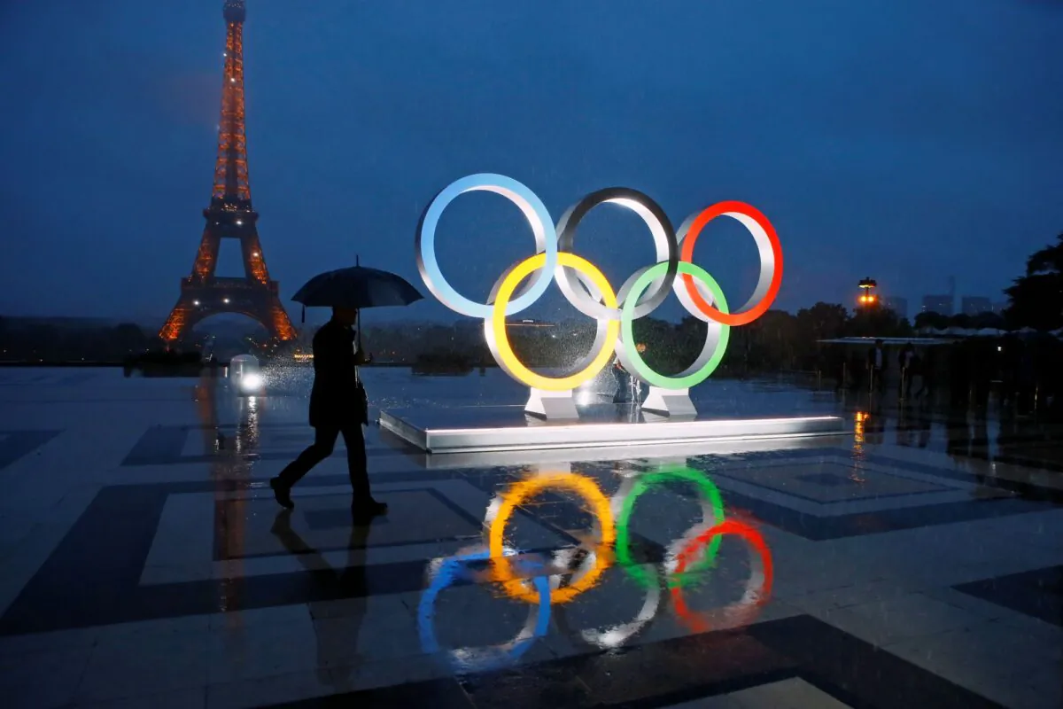 A display of the Olympic rings is set up on Trocadero plaza that overlooks the Eiffel Tower, after the vote awarding the 2024 Games to the French capital, in Paris, on Sept. 13, 2017. (Francois Mori/AP Photo)