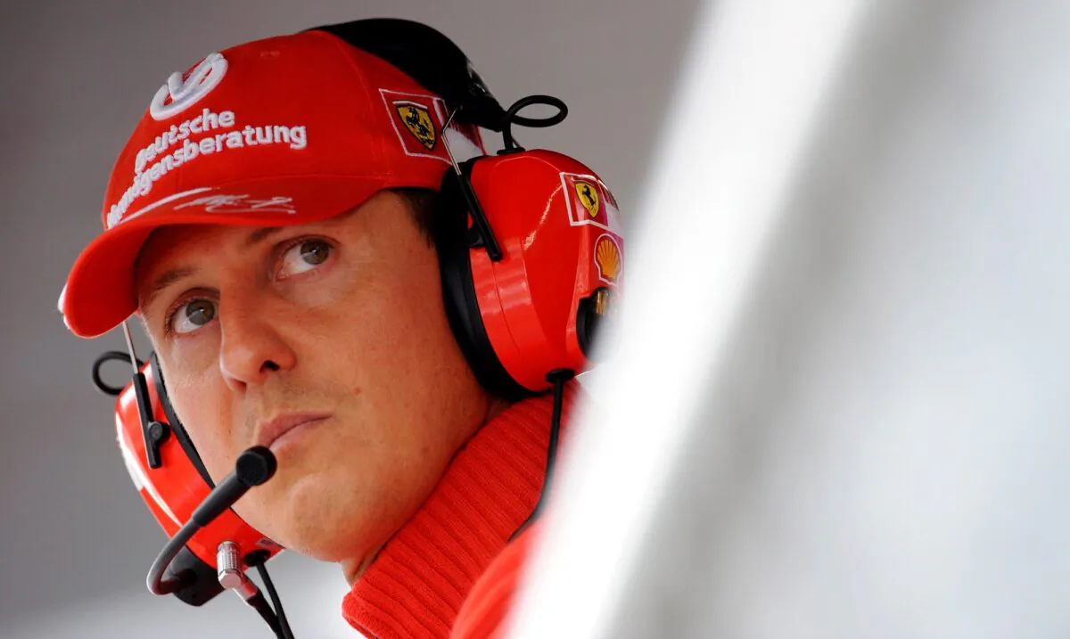 Former Ferrari driver Michael Schumacher of Germany looks on during the qualifying session for the Italian F1 Grand Prix race at the Monza racetrack in Monza, near Milan in this September 13, 2008 file photo. (Alessandro Bianchi/Reuters)