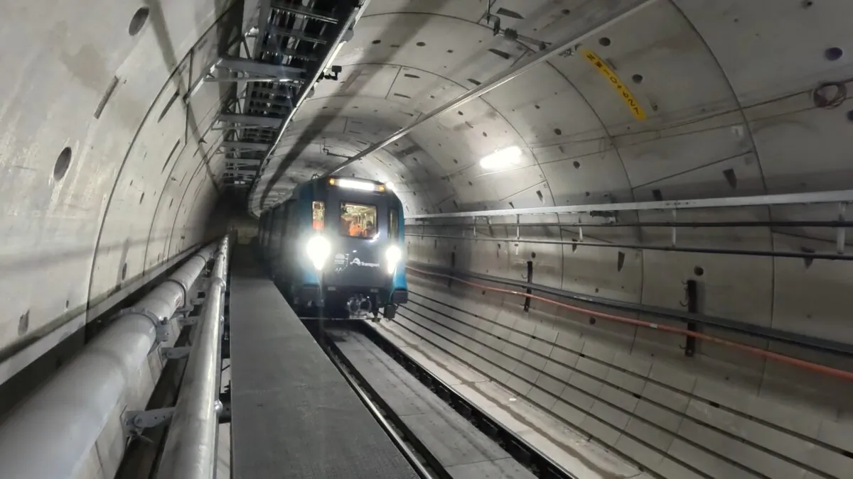 A supplied video screenshot shows a train making the first railway crossing below Sydney Harbour in Sydney, April 21, 2023. (AAP Image/Supplied by the NSW Minister for Transport)
